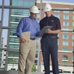 Two men on a construction site
