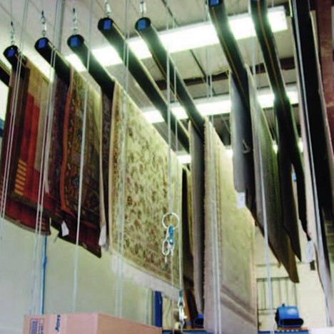 rugs hanging out to dry